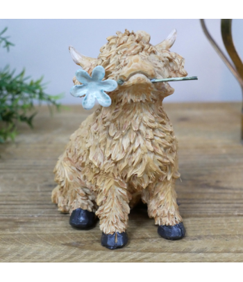 Highland Cow With Flower In...